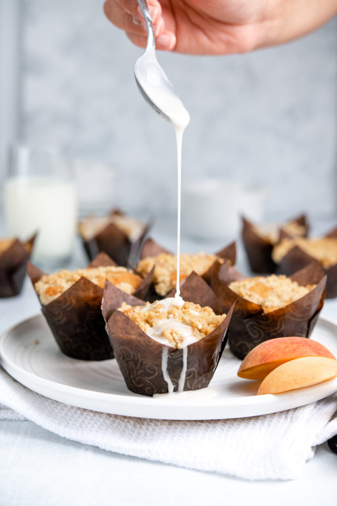 peach crumble muffins with icing
